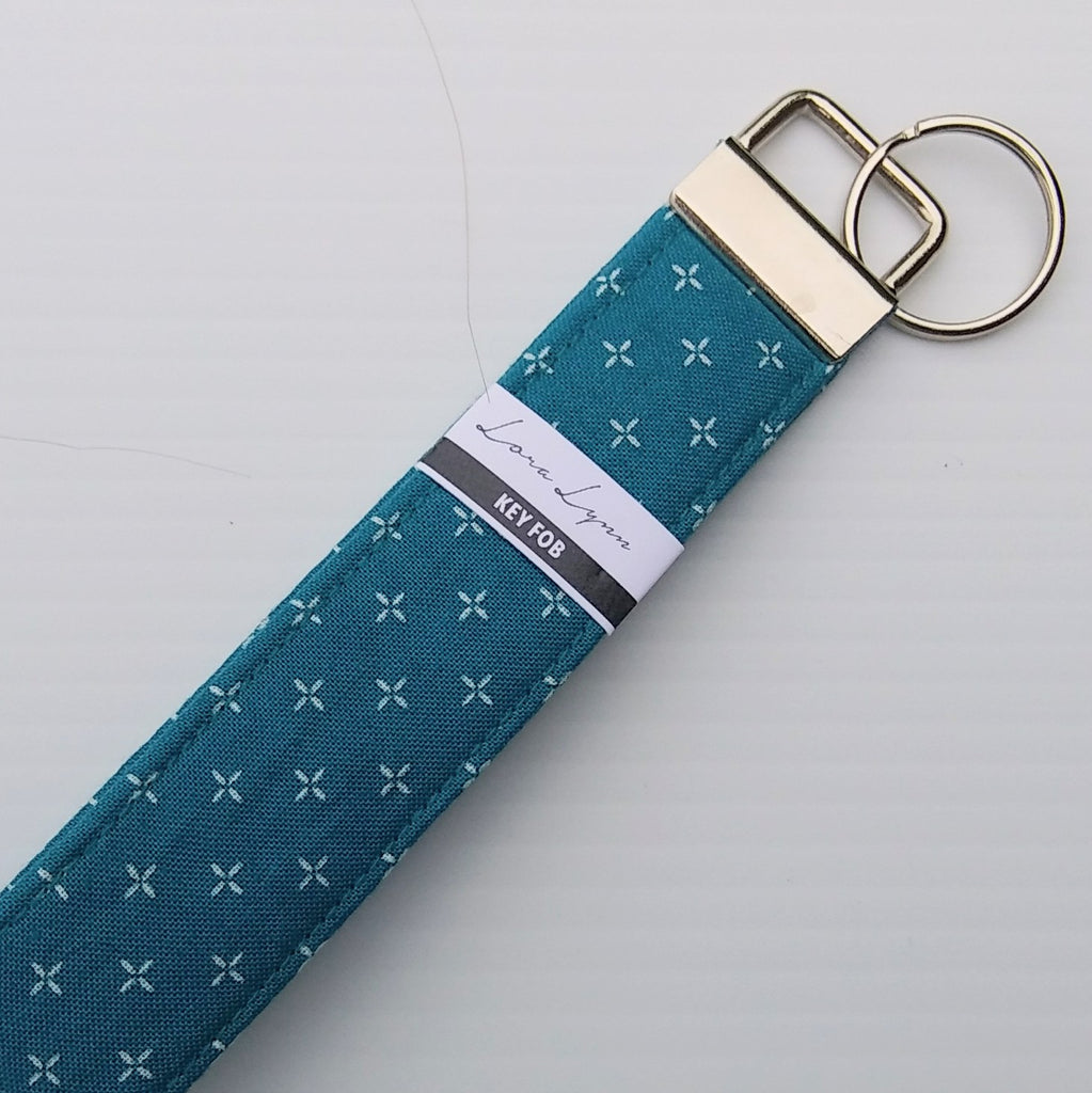 TURQUIOSE WITH WHITE X 55 Key Fob Wristlet