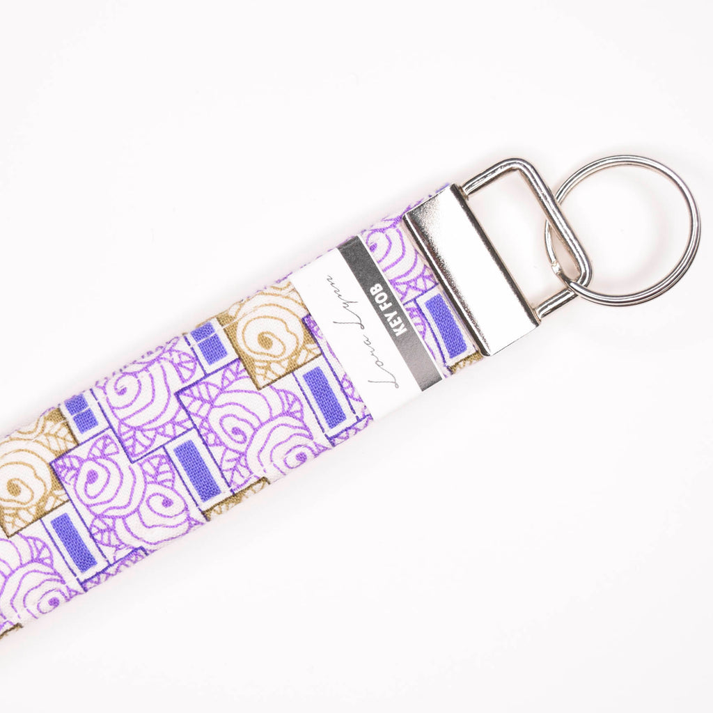 White with lavender and green lines 4 Key Fob Wristlet