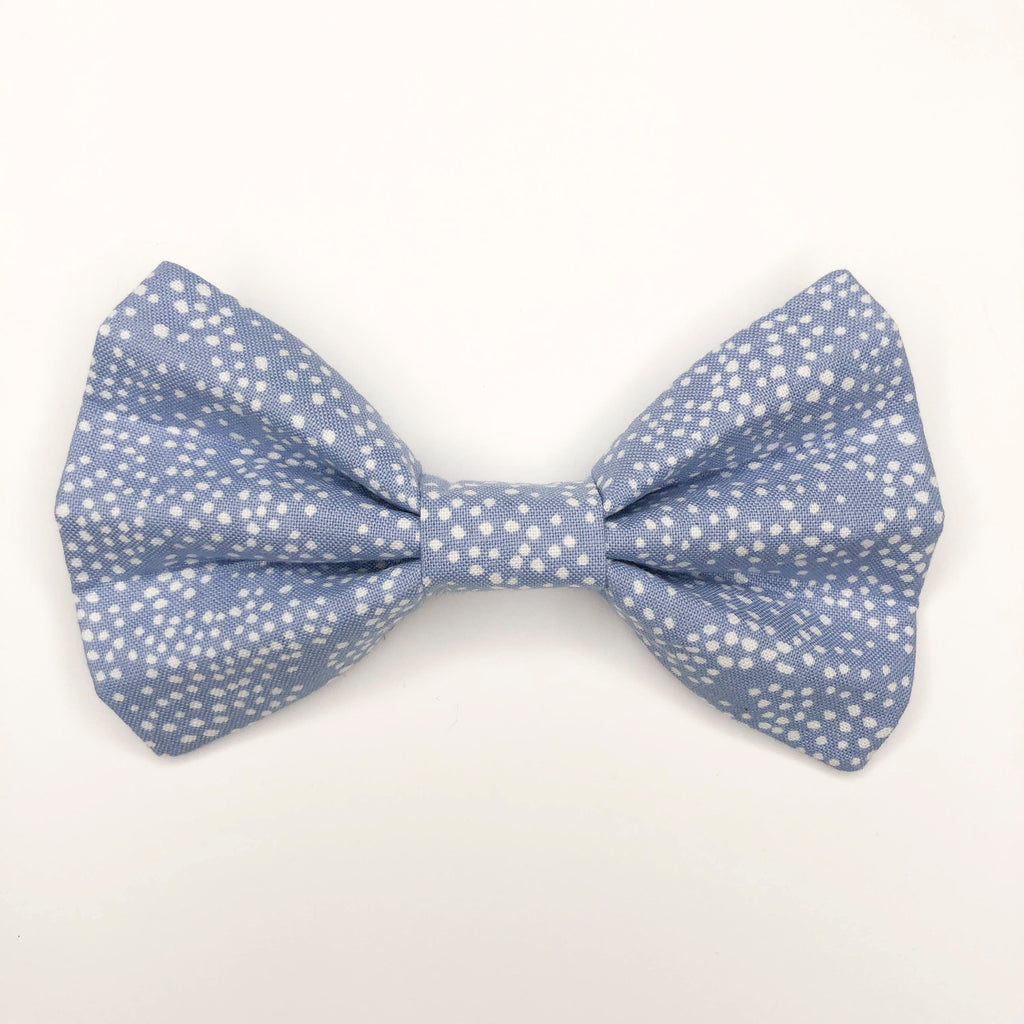 Quality bow tie made for large dogs, dogs with long fur, and little dogs looking to make a bold statement.  Each bow tie is made with quality quilting cotton and stiff interfacing with two loops of elastic. The two elastic loops to prevent bow tie drooping and fits tightly over a standard 1” wide dog collar.  Bow tie Length 5“". Height 3.5".  Elastic fits 1” collar.  Lora Lynn Design